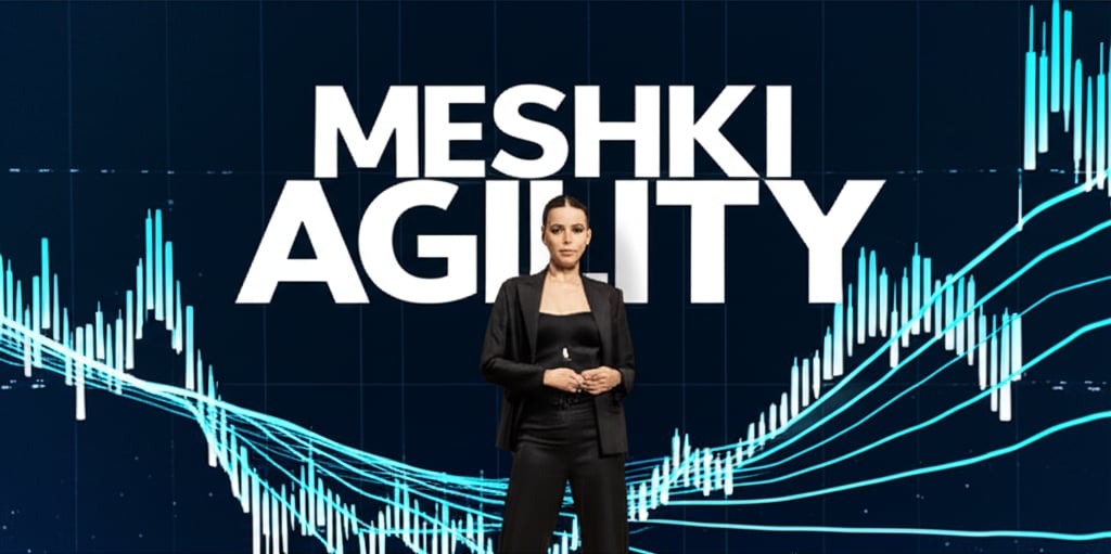 A high-fashion model in chic MESHKI apparel in a dynamic digital scene with fluctuating data lines and 'MESHKI AGILITY'.